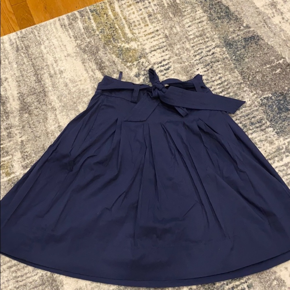Navy pleated skirt